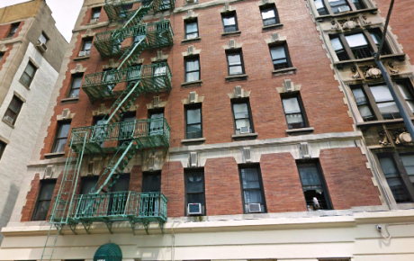 Urban apartment facade with fire escape