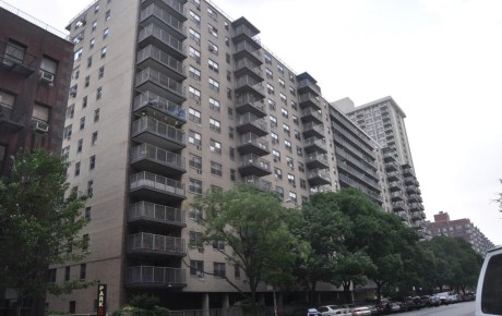 Tall apartment buildings with balconies