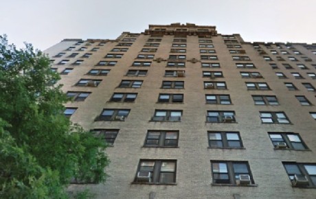 Tall apartment building with many windows