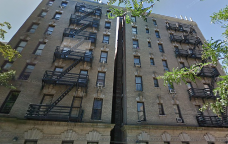 Brick apartment buildings with fire escapes