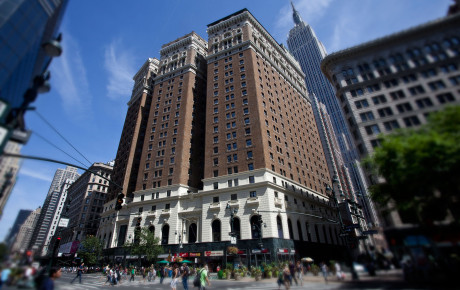 Street view of tall city hotel